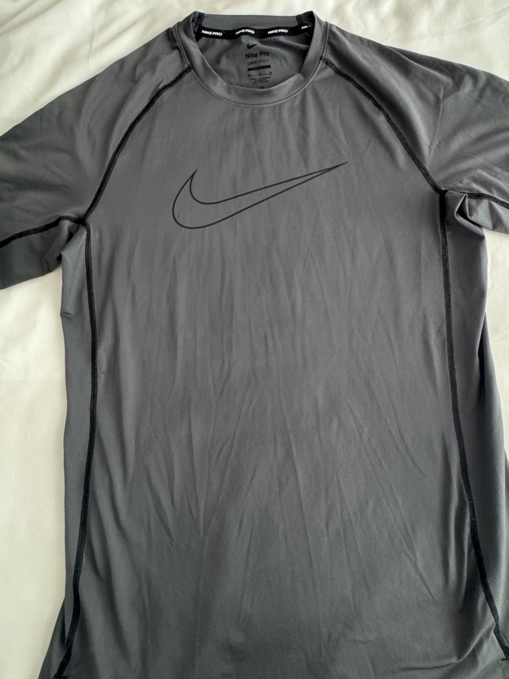 Nike Men’s Gray Short-Sleeve Swim Rash Guard with Black Swoosh